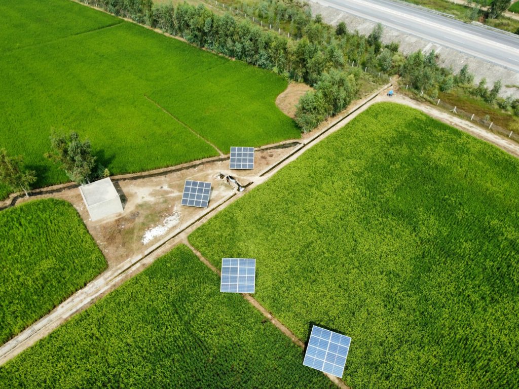Solar panels on green farmland