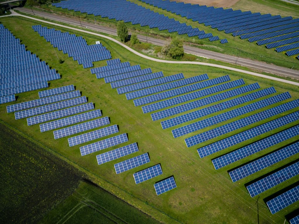 Ground-mounted solar panels on open land