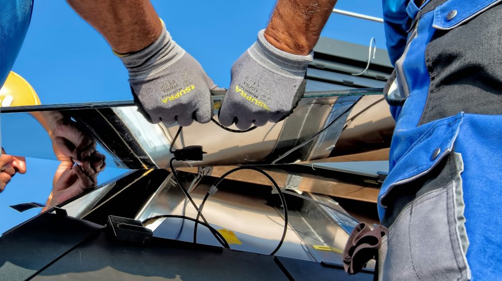 Engineer wiring a solar panel